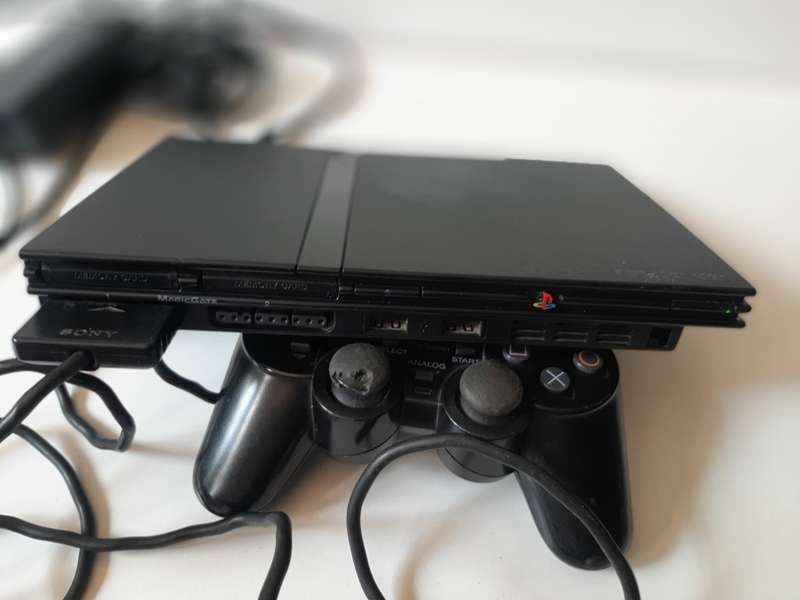 PS2 Slim Powers up but not reading disk