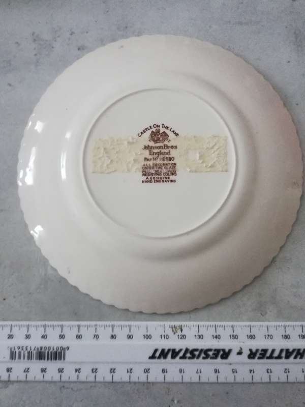 Collection of decorative plates, one Limoges and one Johnson Bros.  Pretty.