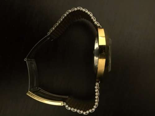 rado diastar gold plated with dimaonds
