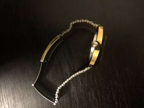 rado diastar gold plated with dimaonds