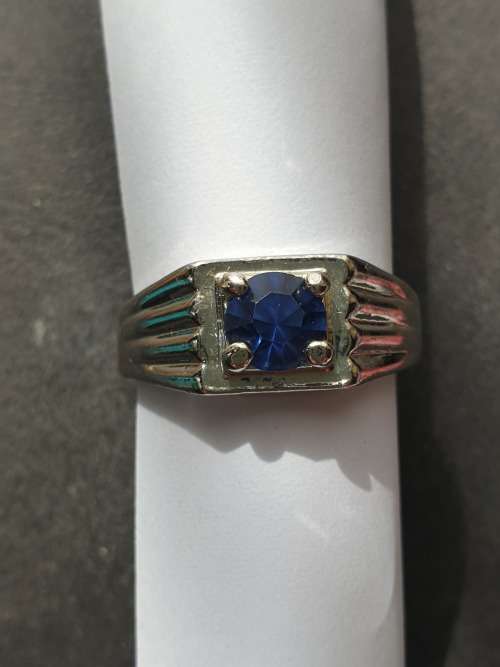 silver ring with blue stone