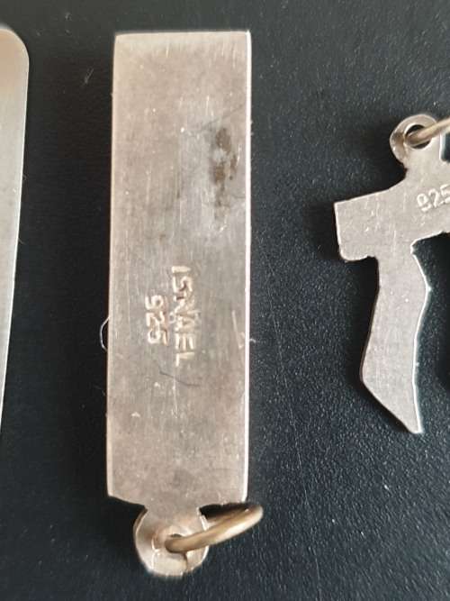 4 silver pendants sold as a job lot