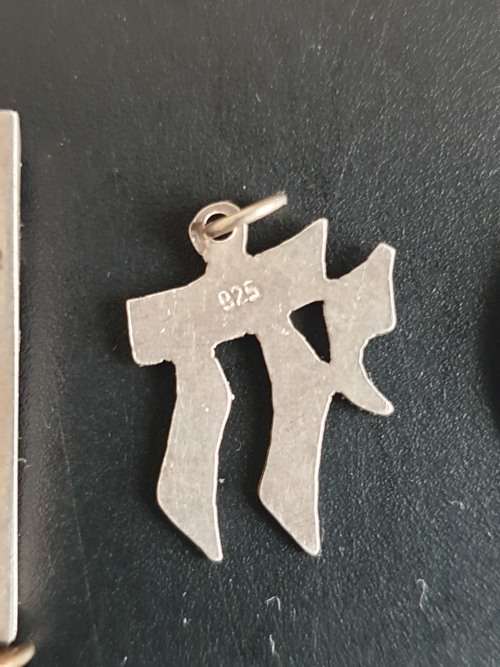 4 silver pendants sold as a job lot
