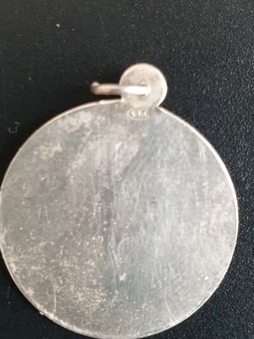 4 silver pendants sold as a job lot