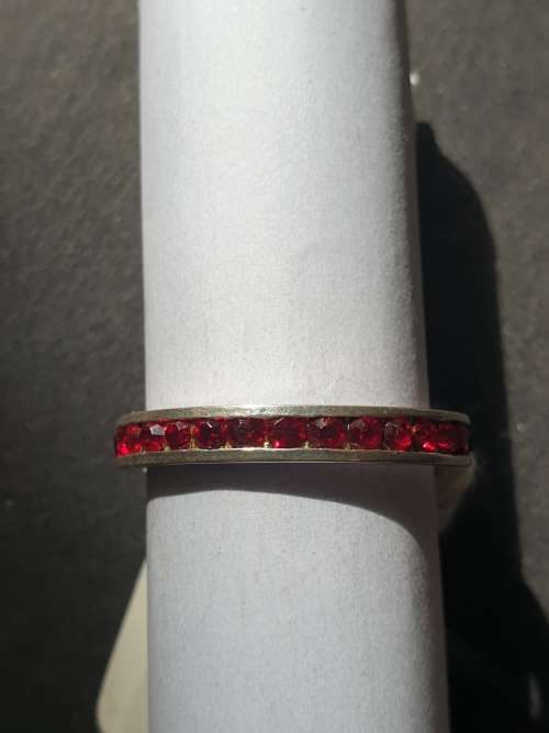 eternity ring with red stones