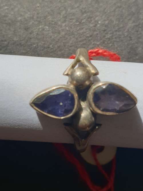 silver ring with a 2 smokey stones stamp 925