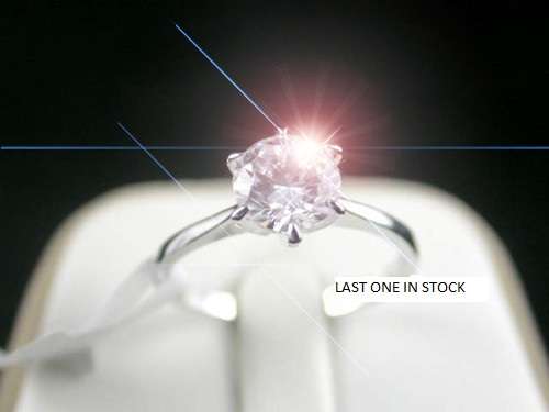 Engagement Solitaire ring size 8 in 18k White gold with perfect cut simulated diamond.