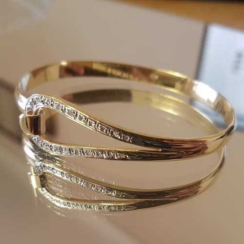 Stunning Gold and Diamond Lock Bangle