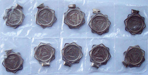 10 RSA SILVER TICKEYS IN SILVER PENDANT SETTINGS-THEY APPEAR UNCIRCULATED