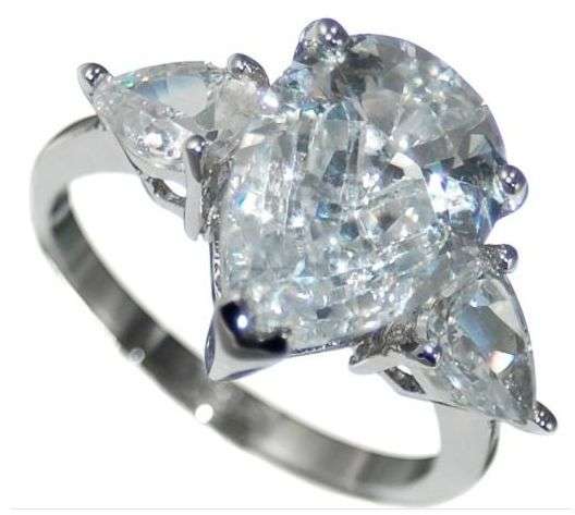 **6.30CTW TRILOGY PEAR CUT ENGAGEMENT RING CLAD IN 18K WHITE GOLD SIZE 9