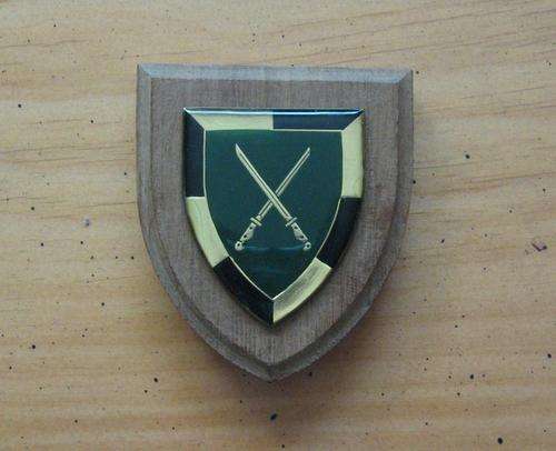 SA ARMY INFANTRY SCHOOL SHOULDER FLASH mounted on a wooden shield