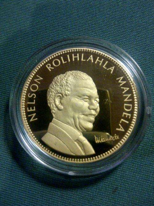 Rare 1994/1999 nelson mandela commemorative medallion 24ct gold plated.Bid per medallion.