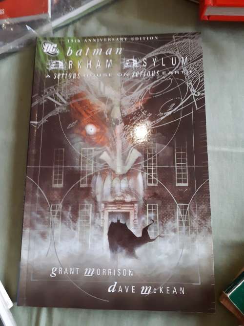 Batman: Arkham Asylum (15th Anniversary Edition) Paperback  November 1, 2005 by Grant Morrison