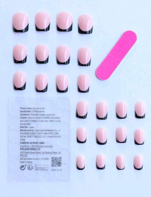 24 piece short nail set with file and sticker sheet.