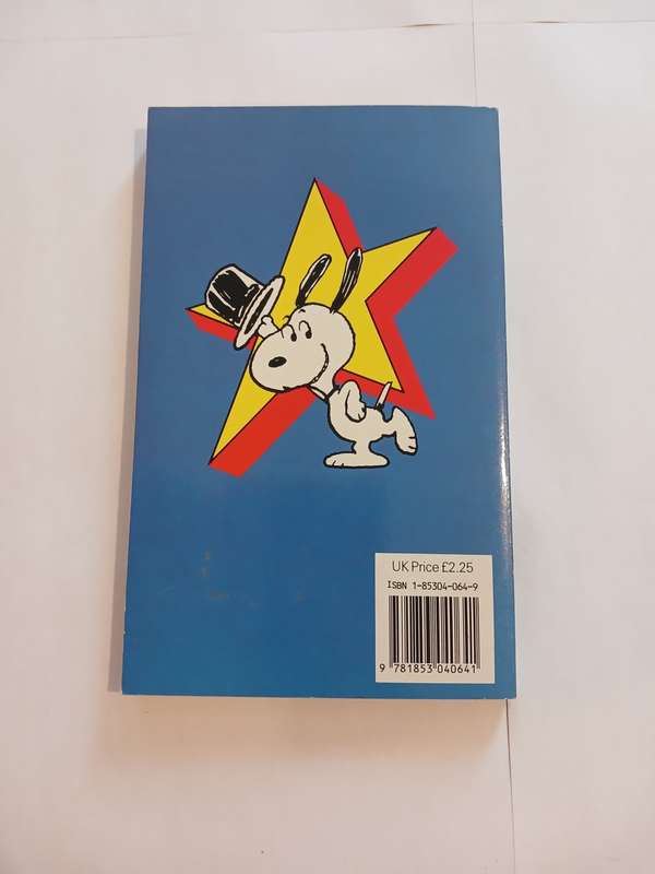 Snoopy stars as The Scourge of the Fairways by Charles M. Schulz