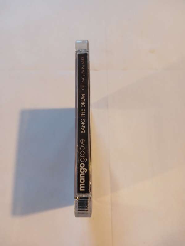 Mango Groove, Bang The Drum CD