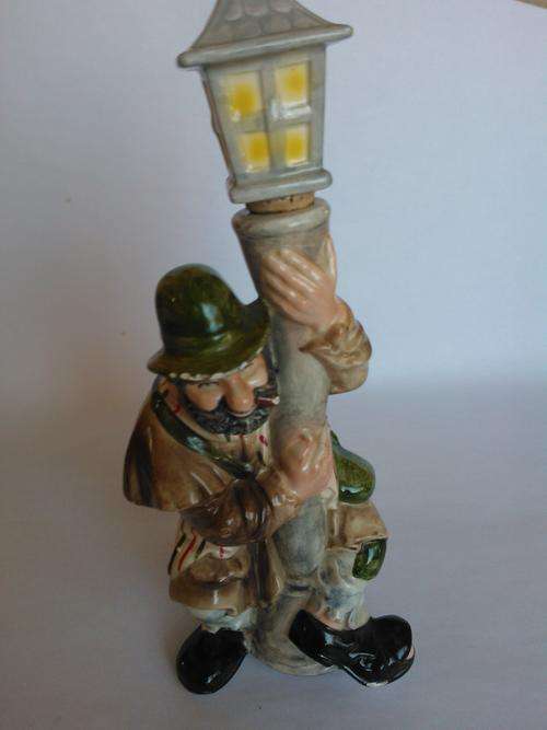 Old man with lampost decanter