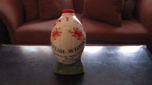 MINI WELSH WHISKY RUGBY BALL PORCELAIN SMALL CHIP ON BOTTOM SECTION