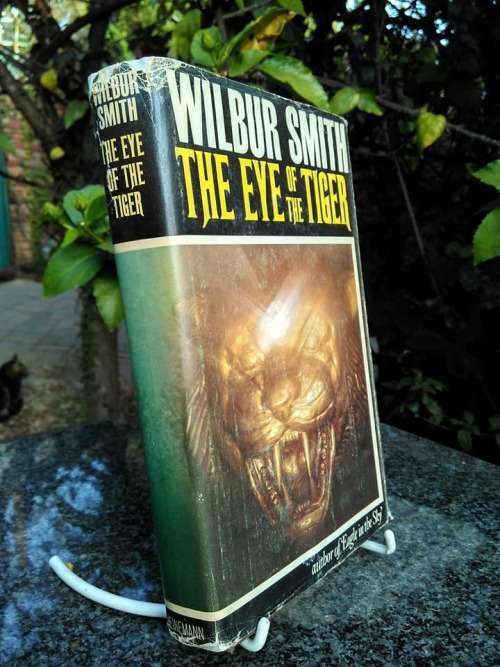SMITH, Wilbur - The Eye of the Tiger - (First Edition Hardcover in Wrapper)