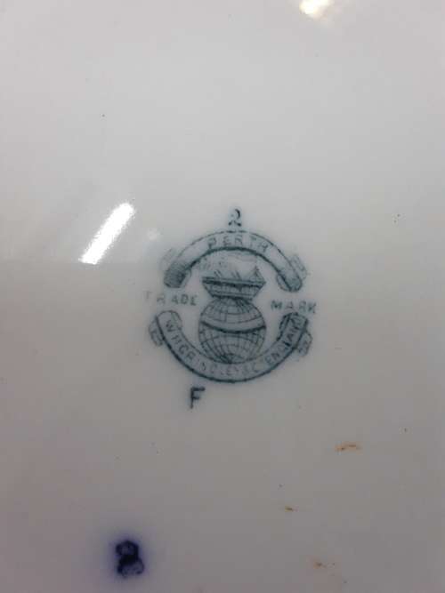 Very old light blue and white wash basin with crack. Made in England. 42 cm. COURIER GUY R150