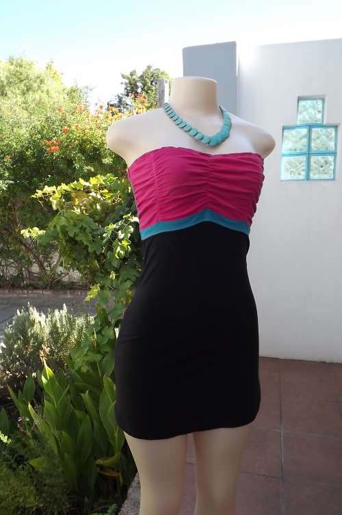 Sexy Hang Ten cotton stretch dress in black with pink + turquoise bodice.Size 30/6.In very good cond