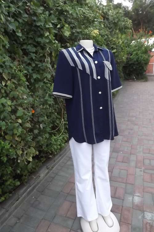 Amazing Navy polyester short sleeves jacket by Exotic Intl Parise.Size 42/18
