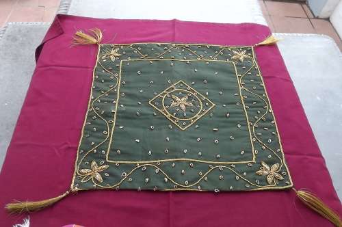Olive green cushion cover in sheer polyester front/satin back.Embroidered in golden thread