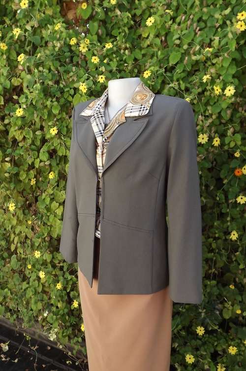 Dark beaver brown 100% polyester jacket by InWear size 34/10.As new condition. Very smart!!