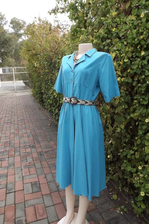 Beautiful skyblue dress by "Shelley" in polycotton size 40/16.Collar and short sleeves.