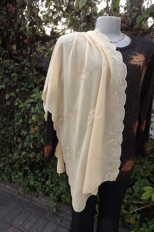 Amazing soft apricot colour embroidered wrap.For chill evenings.Width 53cm length 150cm.As new