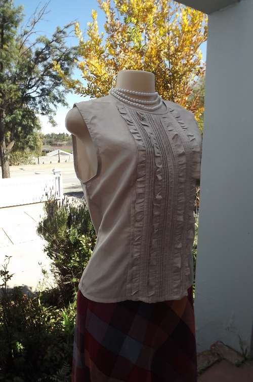 Fabulous Katharine Ross 100% silk blouse from Japan.Sleeveless with tucking and vertical frills