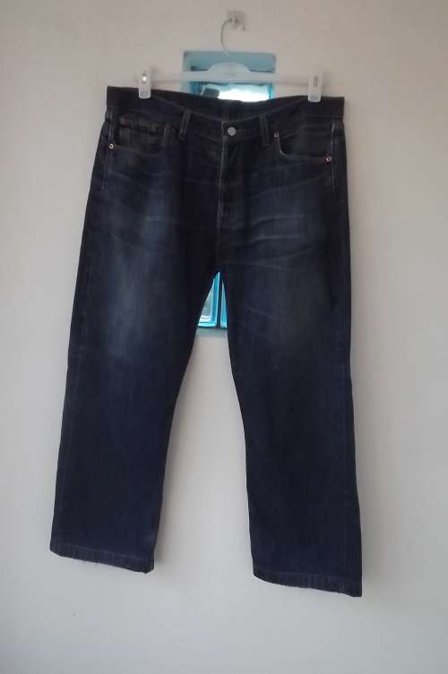 Men's "Levi" blue denim pants.Size 38 waist.Buttoned front.Good used condition.