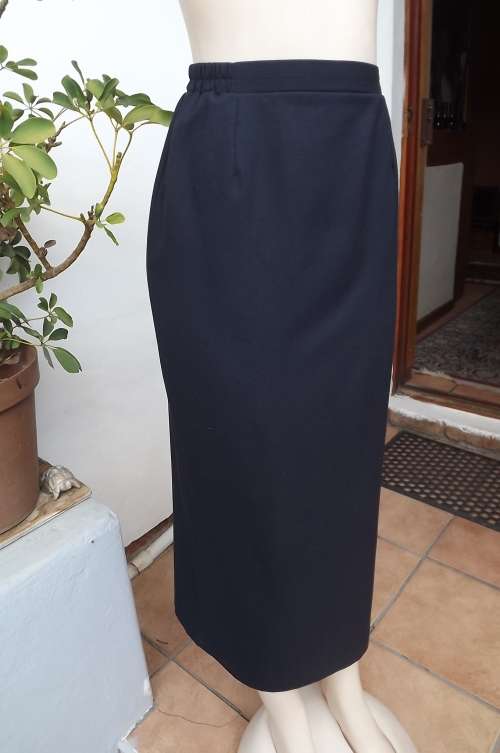 Fabulous navy fully lined pencil skirt in ankle length.Size 38/14 by Marcelci. Long slit at back.