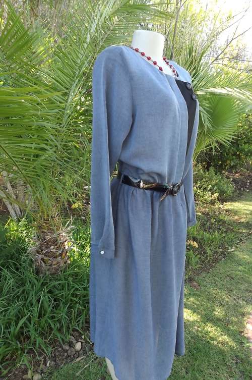 Steelblue vintage dress in textured sheer polyester with long sleeves.Size 38/14.Black decoration