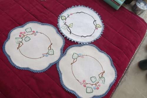 Set of 3 linen doilies with scalloped edging.Finished off with blue crochet stitch.Hand embroidered.