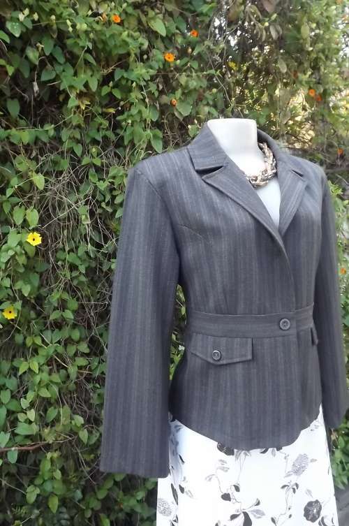 Wear anywear long sleeve jacket with peplum look by IMAGES in size 40/16.New condition