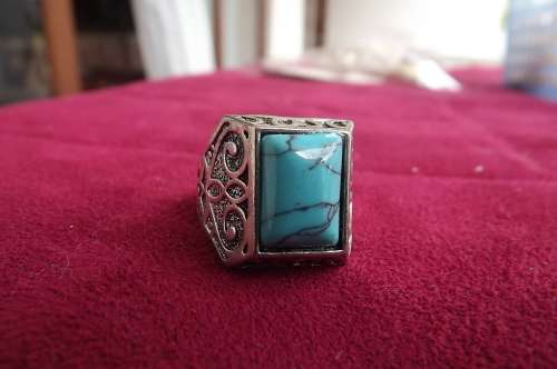 Beautiful bulky silver toned unisex fashion ring with turquoise stone size 10.5.Rhodium plated.