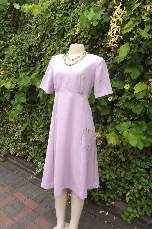 Lovely empire style violet colour short sleeve boutique made dress.A line skirt.Size 36/12.