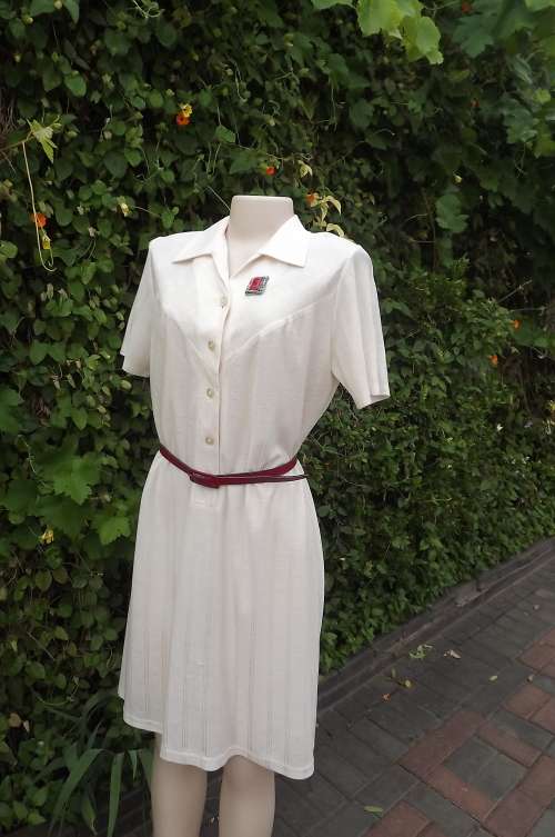 Butter soft rich cream 80's polyester/rayon knit dress.Size 38/14 by FOSHINI. Yoked shoulders