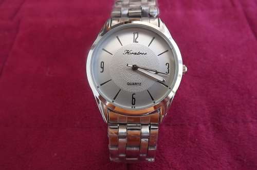 Handsome new quartz watch for boy by KRATREE.With stainless steel strap.Made in Thailand
