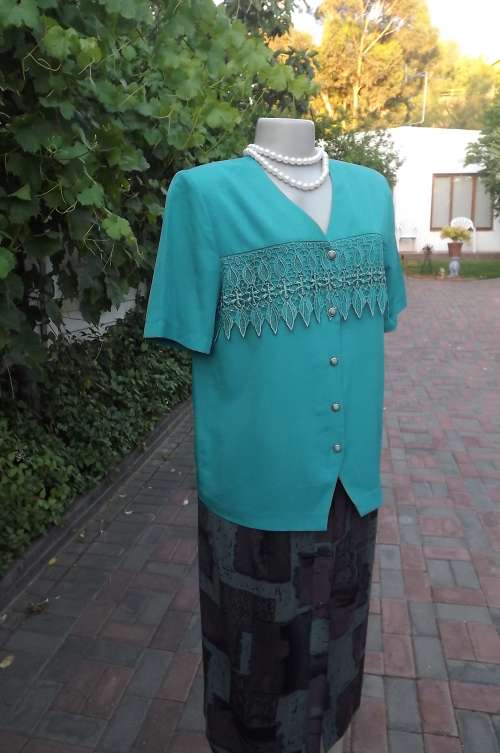 Beautiful summer jade colour short sleeve jacket with lace. V neck button down.Size 36/12.As new