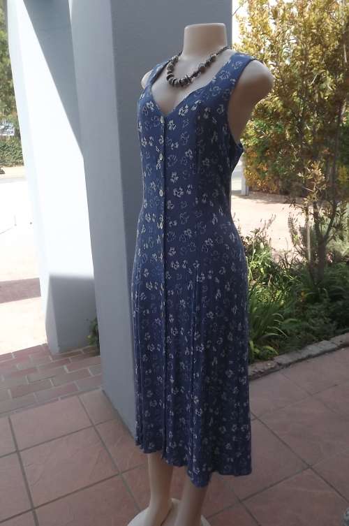 Button down steelblue 100% rayon dress,creased with white floral pattern.Size 38/14 by TRUWORTHS