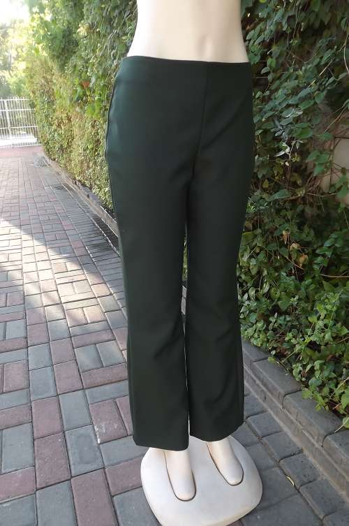 Dark bandless hunters green pants by SMILEY in size 36/12.No pockets.Zip at side with straight legs