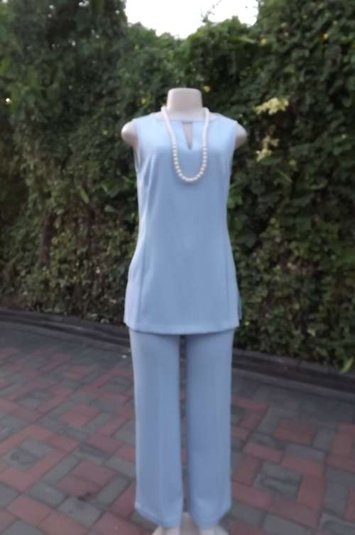 Smart powder blue 2 piece pant suite by OASIS in size 34/10.In 100% polyester.Good condition
