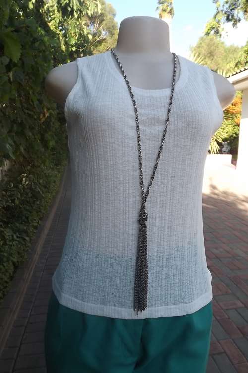 Chic white polyester/nylon blend opaque vest style top by DU FIRRE.Size 34/10. As new