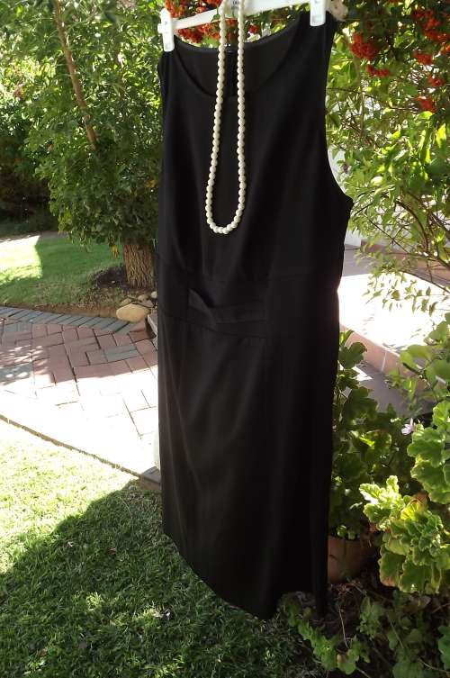 Smart black dress or any special occasion.Size 44/20.Sleeveless with rounded neckline.As new