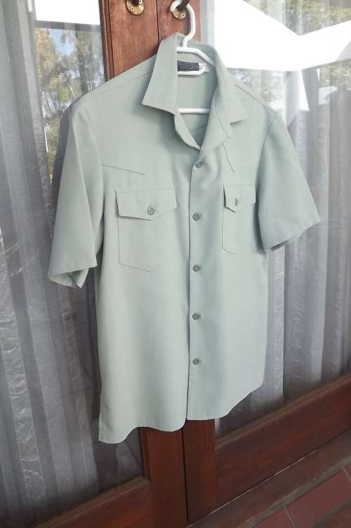 Safari suite jacket in mintgreen.Size 102R by BENITH LEISURE wear.In polyester blend.