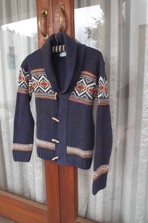 Handsome dark blue cardigan for 13 to 14 year old boy with fairaisle borders.