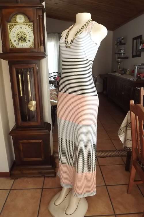 Maxi chemise dress in horizontal black,blue and cerise stripes on cream background.