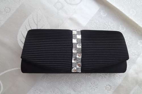 Smart little black satin evening bag pleated front.Can use as cluts or swing bag.